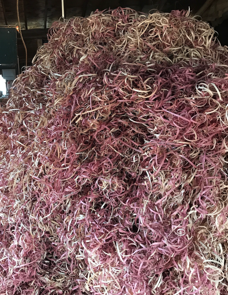 A mountain of red cedar ribbon.